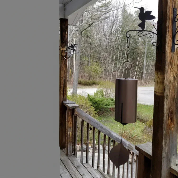 Elegant iron wind chimes in black and brown colors, designed for decorative garden and outdoor use