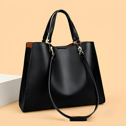 Women's messenger tote bag in horizontal square shape with crossbody strap and internal compartments