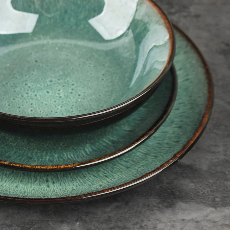 Retro European style porcelain bowls and plates set with round shape on dining table