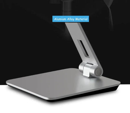 Silver folding phone and tablet stand holding a device, showing its 360-degree rotation and compact size