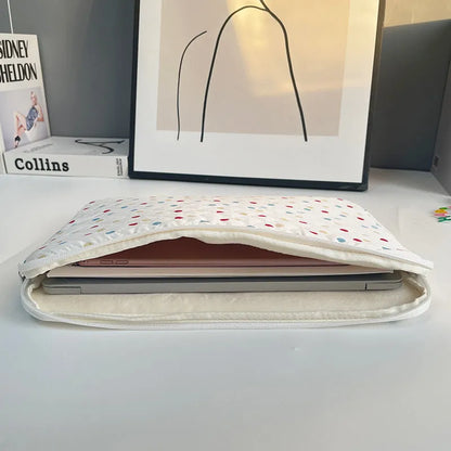 Women's polka dot laptop bag in three size options: 11 inches, 13/14 inches, and 15/15.6 inches.