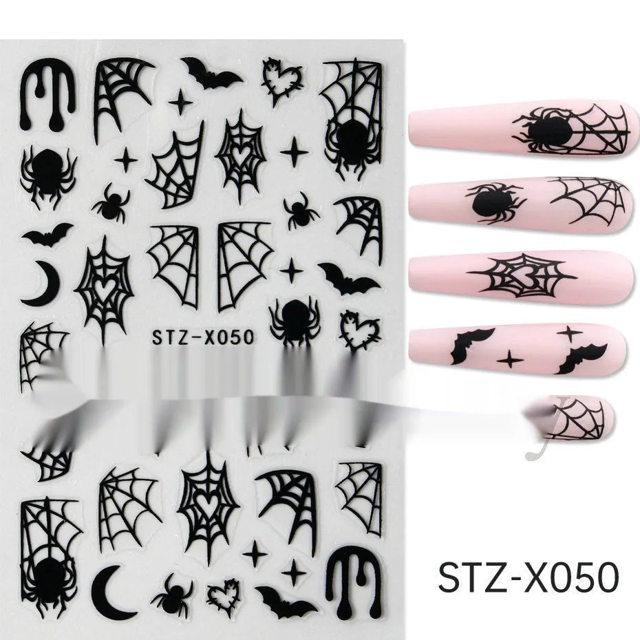 Assortment of black and silver nail sticker designs including cartoon and French tip patterns on a plastic sheet.