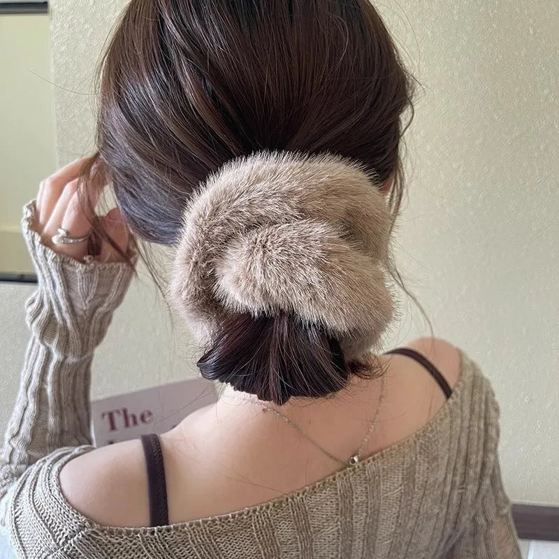 Large intestine coil hair band in mink-like waterproof fabric on a white background.