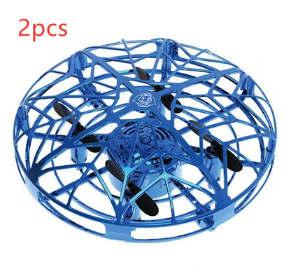 Futuristic mini drone helicopter with UFO-inspired design, automatic obstacle detection, and intuitive controls