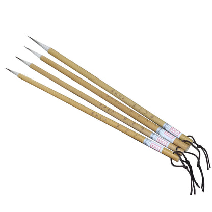 Four traditional writing brushes with gold bodies, wolf wool hair, and pine branch colour