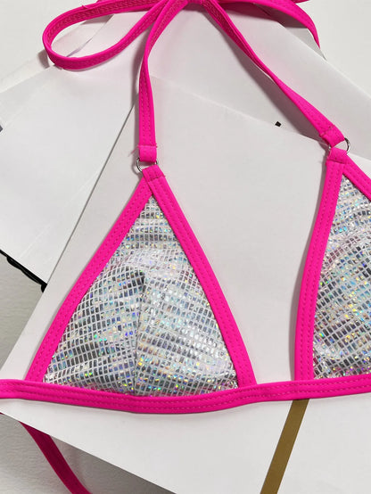 Silver solid colour women's triangle one-piece swimsuit with a split back on a mannequin.