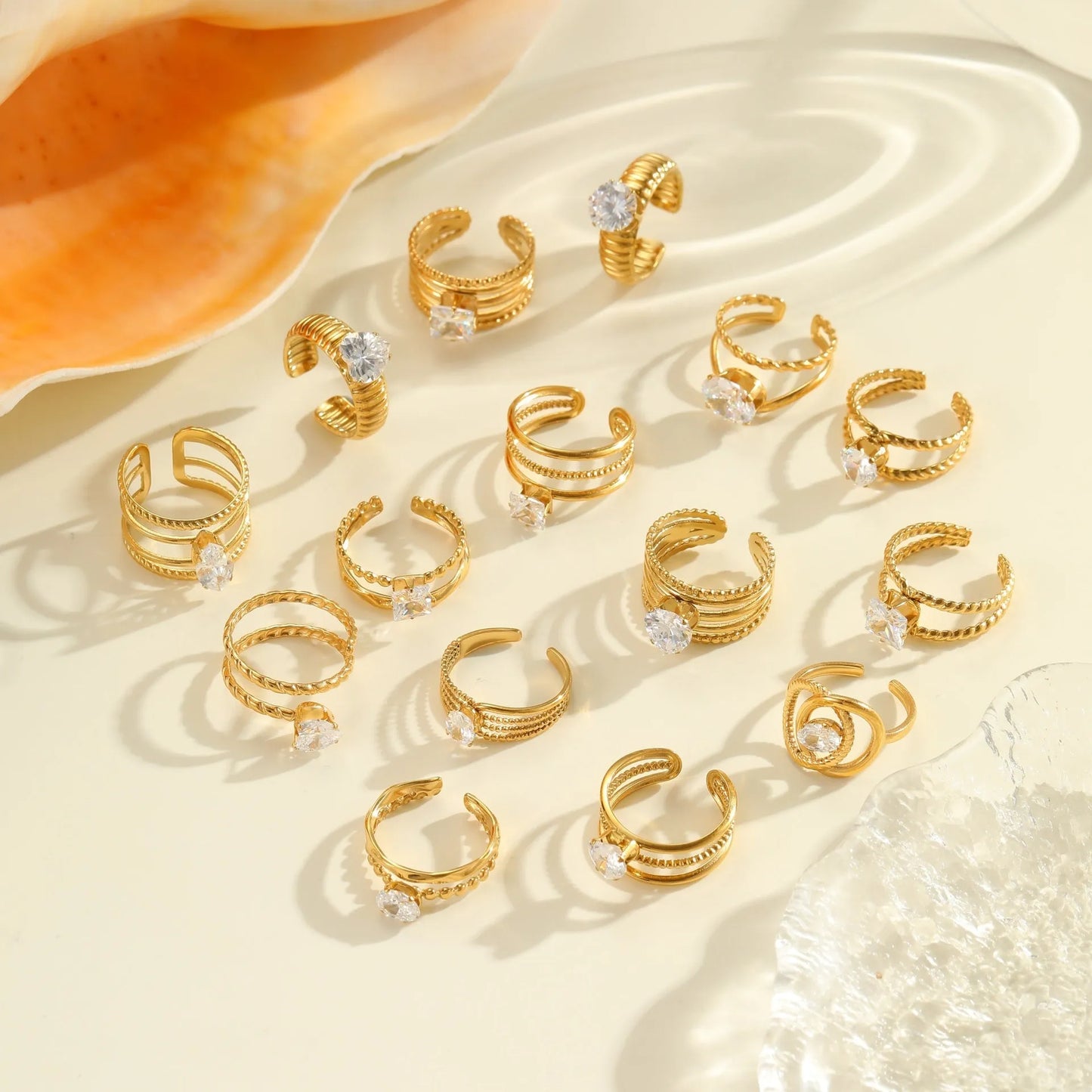 Gold electroplated stainless steel ring with heart shape design and open mouth fitting