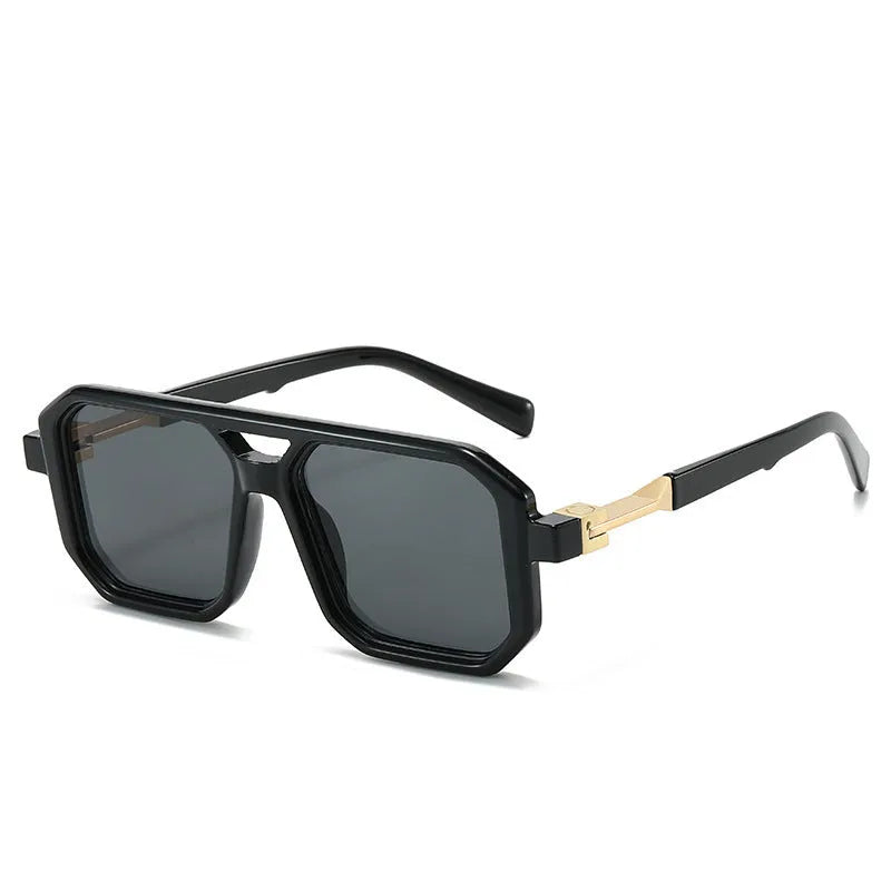 Retro style pilot sunglasses with a double beam metal frame and grey tinted lenses.