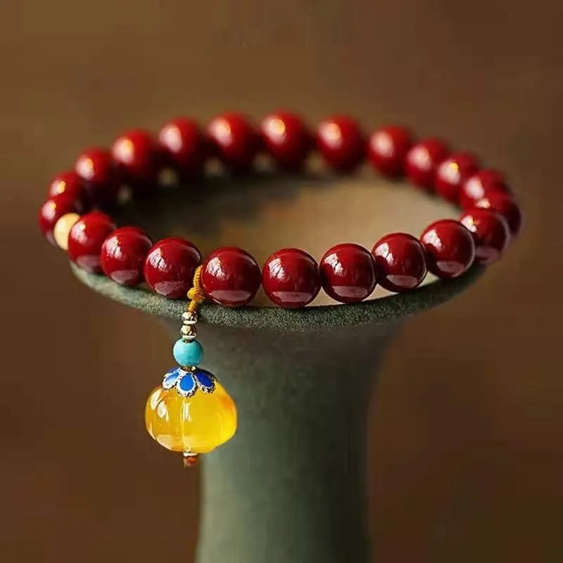 Handmade gold cinnabar wave bracelet with copper beads in national style design