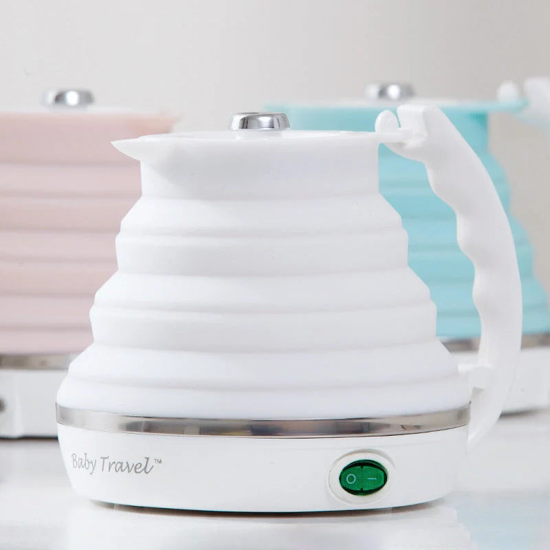 Foldable electric kettle in white, blue, and pink with UK, US, and EU plugs