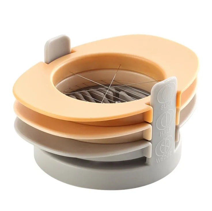 Three-function manual egg cutter in blue with stackable design for kitchen use