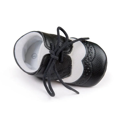 Men's vintage soft-soled baby shoes in synthetic leather, shown in light brown colour