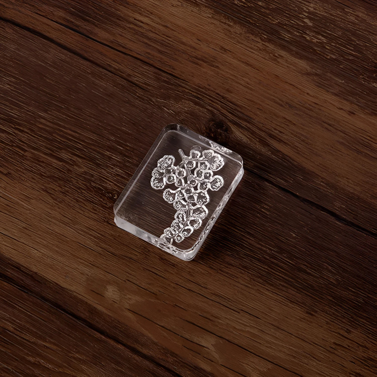 Transparent acrylic hand account seal with laser-engraved dragonfly design measuring 12mm height