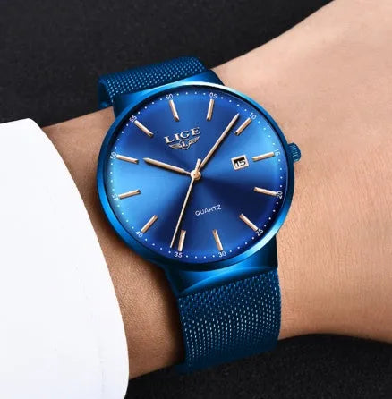 Men's stainless steel watch with 40mm dial on wrist, showing all-black colour option