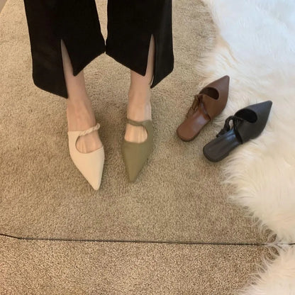 Women's soft leather-lined semi-toe box slippers in neutral colours on a rubber sole.