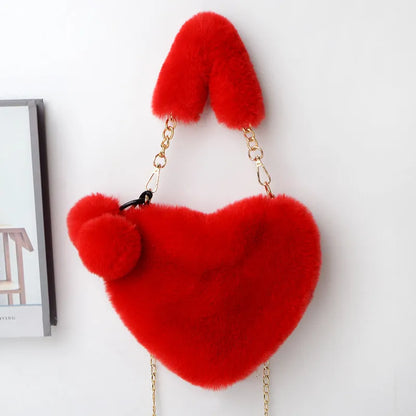 Plush heart-shaped women's handbag in medium size with removable shoulder strap