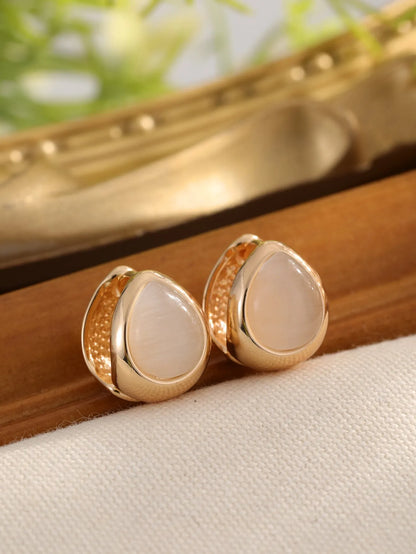 Cat's eye stone water drip ear buckle earrings in gold or silver colour, retro niche design for women.