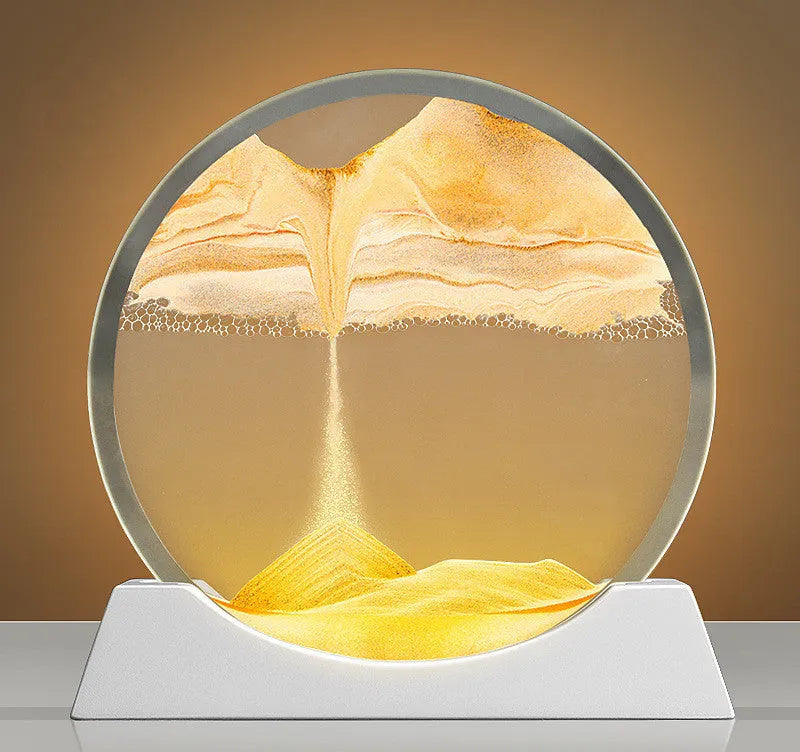 Modern abstract quicksand painting rotary night lamp in blue, 12 inches tall on a desktop.
