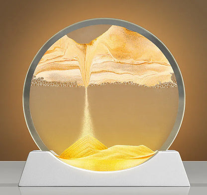 Modern abstract quicksand painting rotary night lamp in blue, 12 inches tall on a desktop.