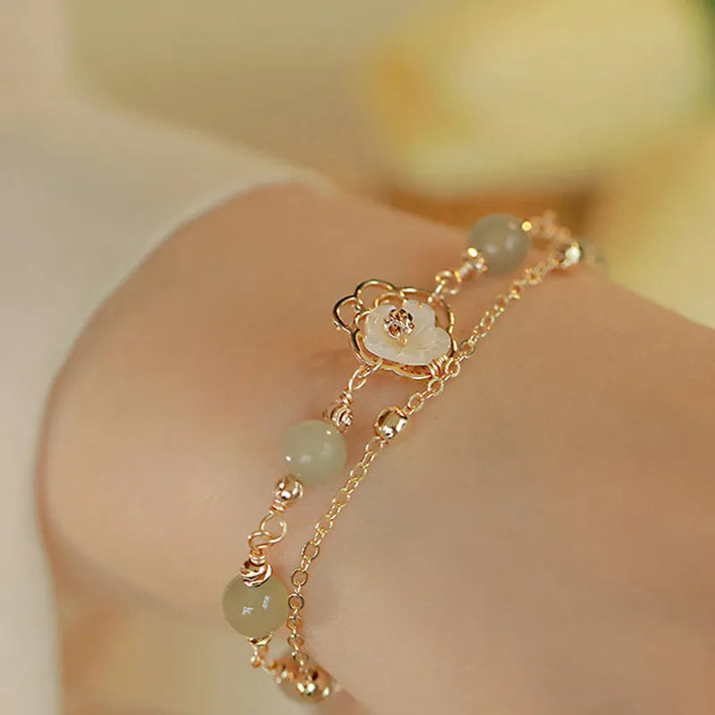 Yellow gold electroplated copper butterfly bracelet with geometric shapes for women