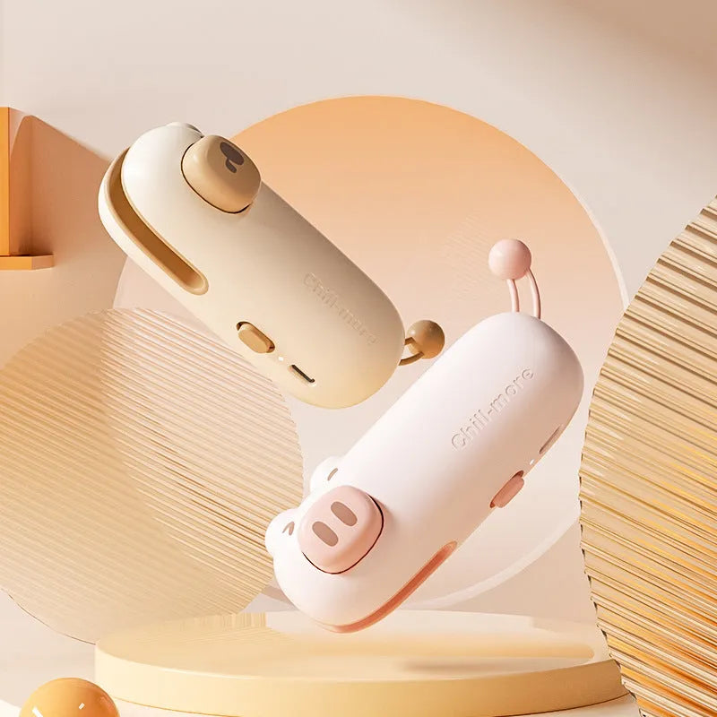 Pink handheld bag sealer machine with USB charging port and cartoon design