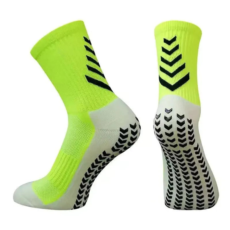 Men's mid-calf athletic football socks with geometric patterns and silicone grip sole