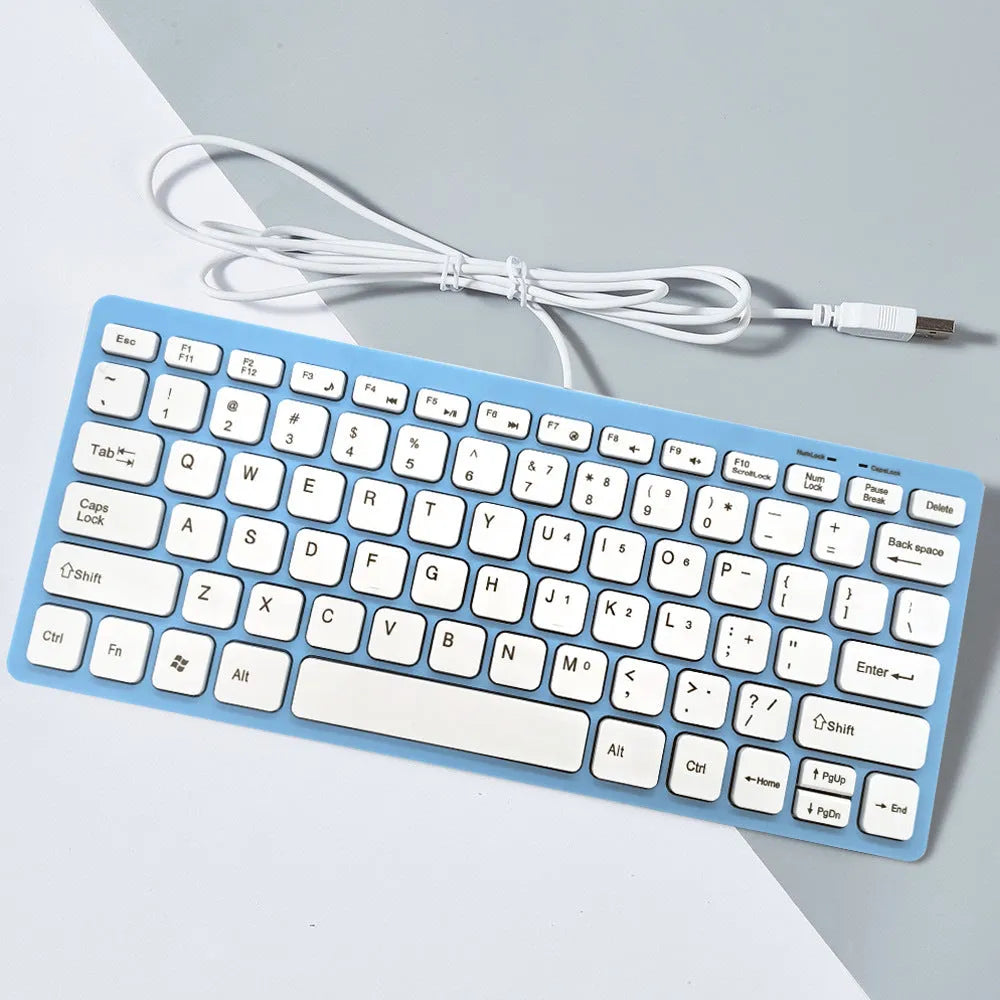 USB wired mini keyboard in four colour options showing compact 280mm design