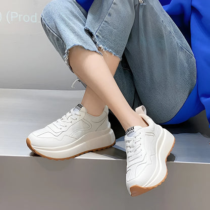Beige women's low-top casual sports shoes made from cattlehide leather with round toe and front lace-up.