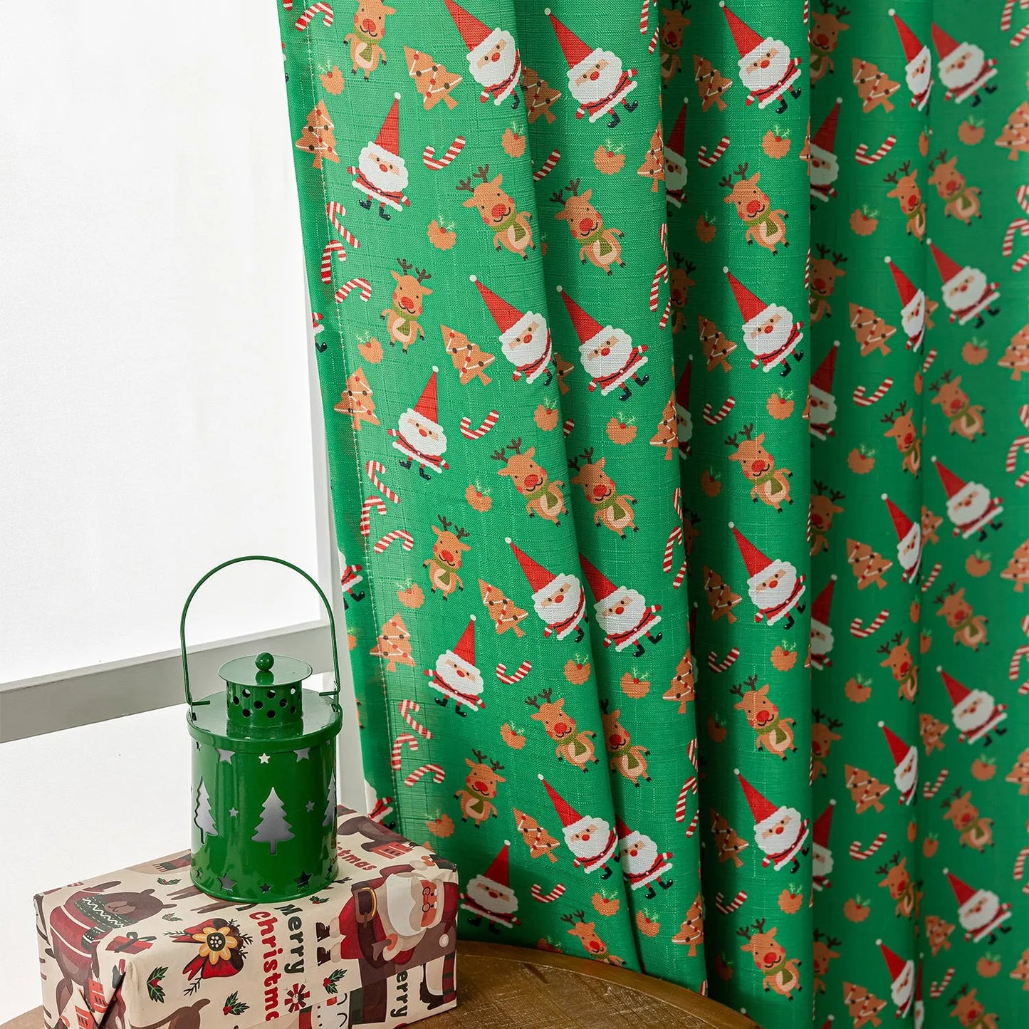 Christmas Snowman Angel Print Curtain showing festive cartoon pattern with 1 metre measurement and semi-sun shade function