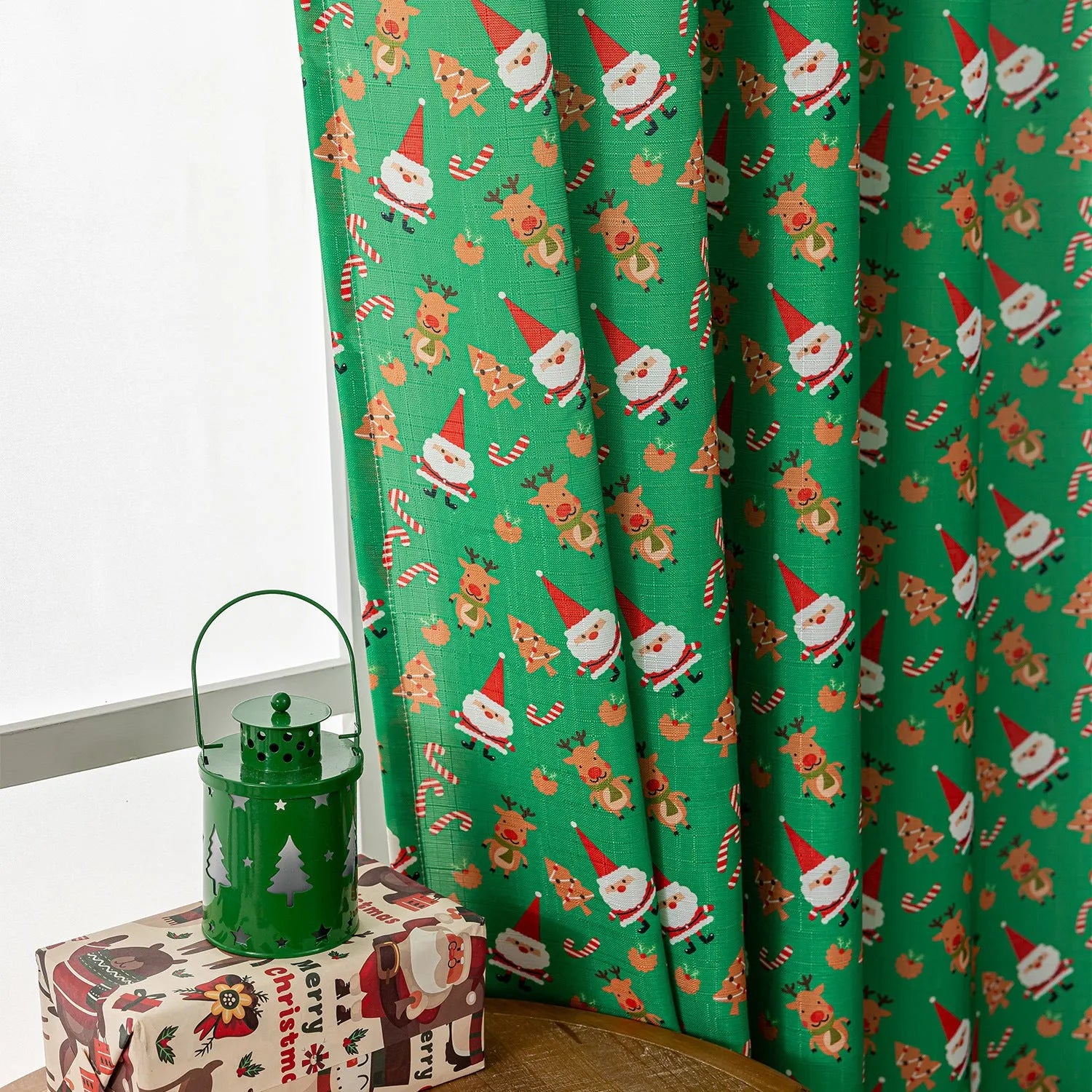 Christmas Snowman Angel Print Curtain showing festive cartoon pattern with 1 metre measurement and semi-sun shade function
