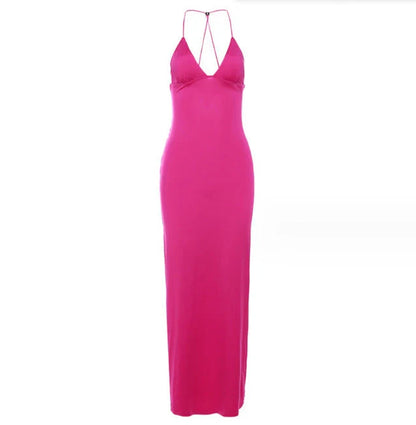 A stylish halter dress with a floral print and butterfly-inspired back, perfect for summer events and parties.