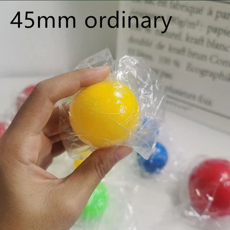 Colorful, luminous stress relief balls with a sticky surface for bouncing, squeezing, and sticking to surfaces