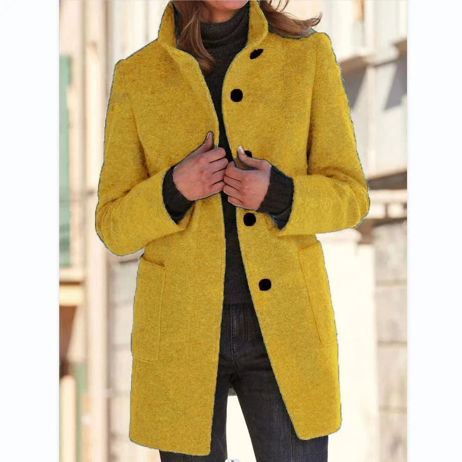 Stylish wool coat with stand collar, pockets, and slim fit design for casual winter wear.