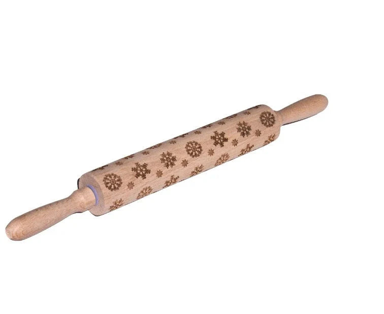 Festive rolling pin with embossed Christmas designs for easy imprinting on dough