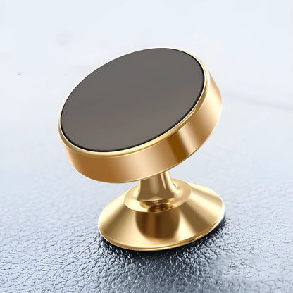 Silver aluminium alloy magnetic car phone holder with rotating ball head mounted on a car air vent.