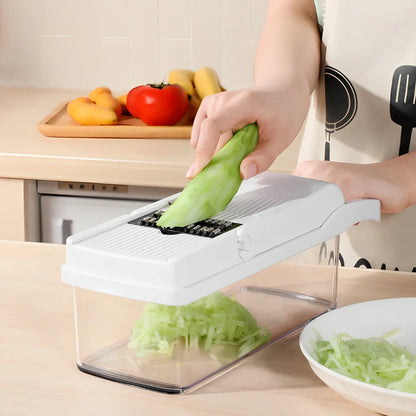 Multipurpose vegetable cutter with 7 blades, drain basket, and hand guard for kitchen food preparation