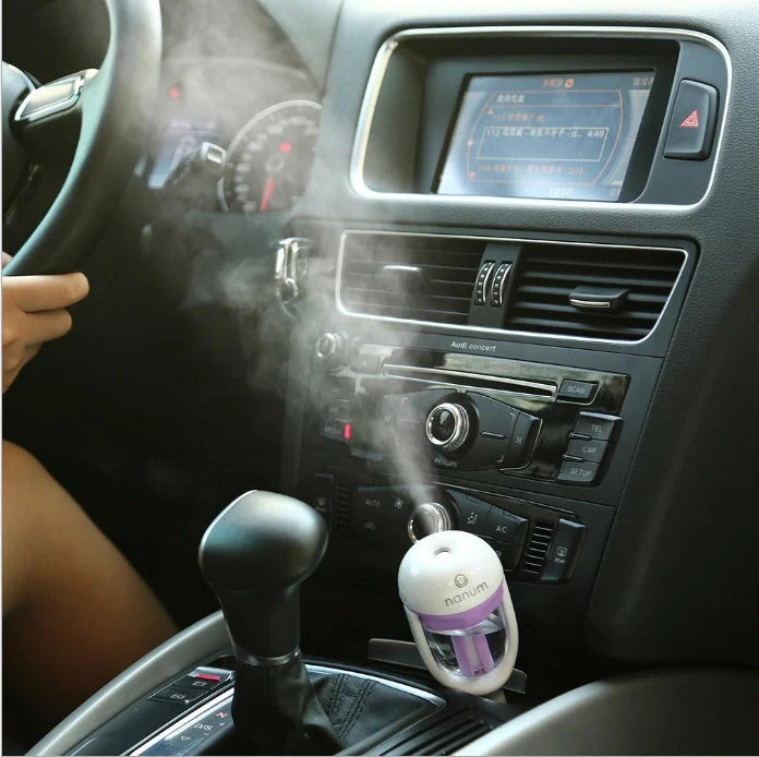 Compact car humidifier with essential oil diffuser and air purifier in various colours