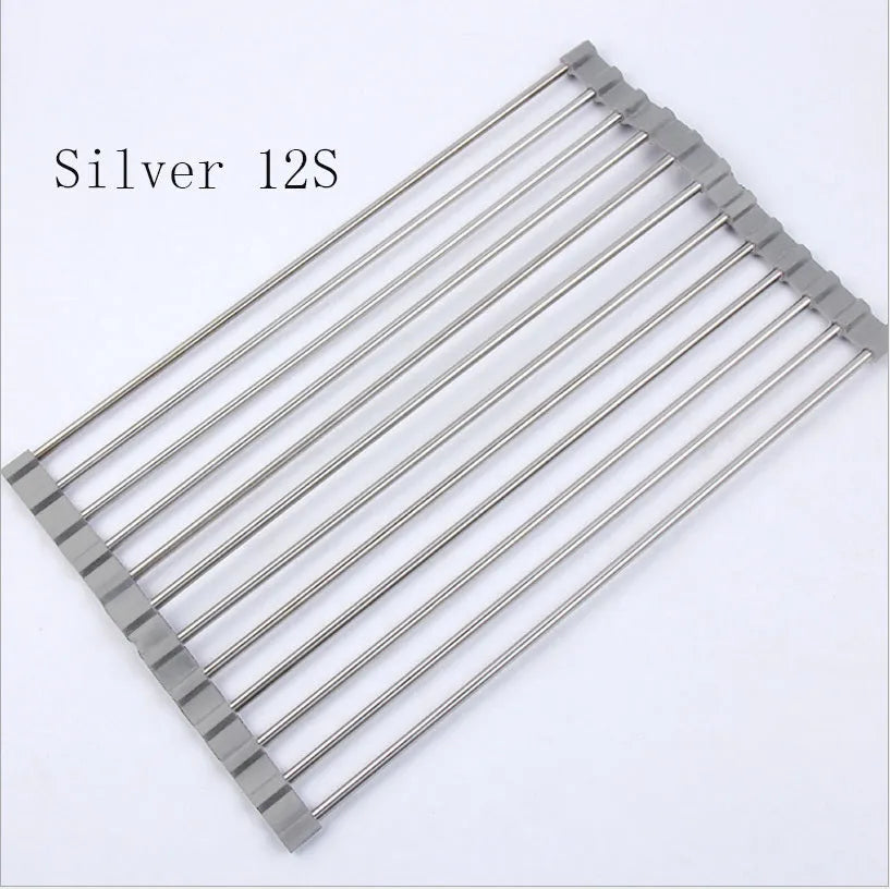Folding stainless steel kitchen drain rack with coloured plastic tubes, shown open for use.