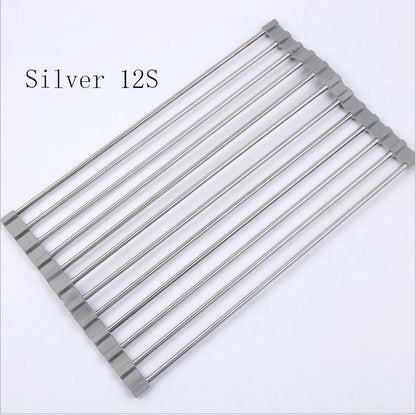 Folding stainless steel kitchen drain rack with coloured plastic tubes, shown open for use.
