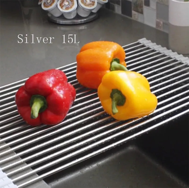 Folding stainless steel kitchen drain rack with coloured plastic tubes, shown open for use.