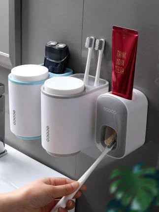 Wall-mounted automatic toothbrush holder with toothpaste dispenser and mouthwash cup for organized bathroom storage