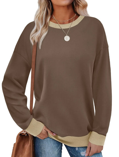 Loose fit striped long sleeve top for women on a hanger, shown in apricot colour.