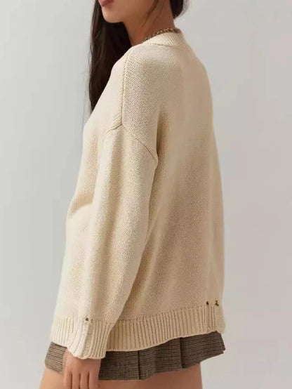 Women's milky white round neck acrylic sweater with Jacquard texture and loose-fitting long sleeves