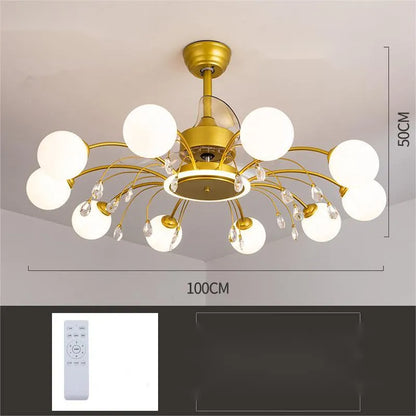 Black and gold ceiling fan lamp with acrylic shade and metal blades, shown with remote control.