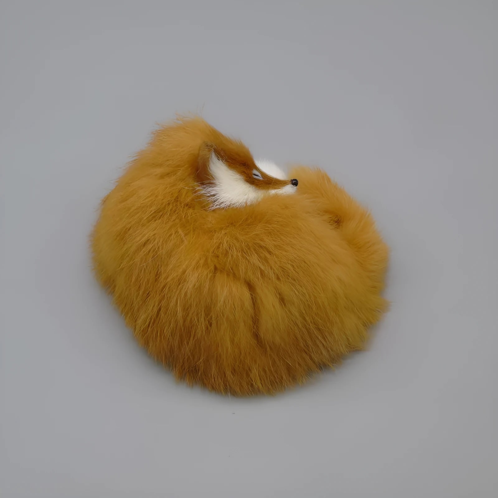 Artificial white fox fur decorative handicraft for car dashboard in red, white, or yellow colours.