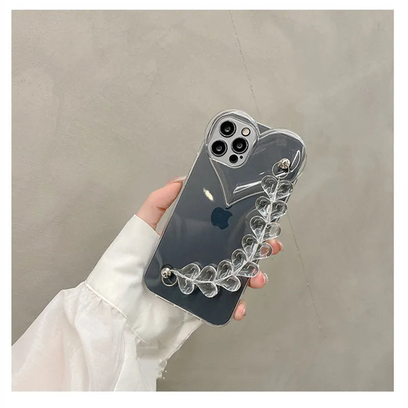 Transparent TPU iPhone case with love bracelet heart chain design on a mobile phone.