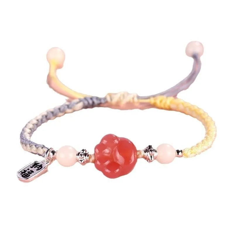 Handmade red cat's paw charm bracelet with glass beads in pink or yellow woven design