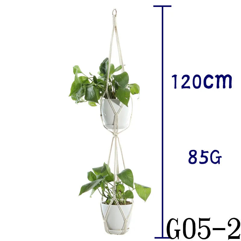 Handmade beige cotton rope net bag holding a plant pot, showing its textured sling design.