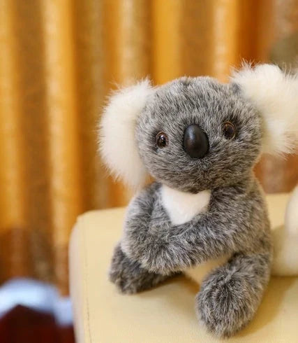 A soft, cuddly koala plush toy with short, premium plush fur and 100% pure cotton filling, showcasing the high-quality British craftsmanship.