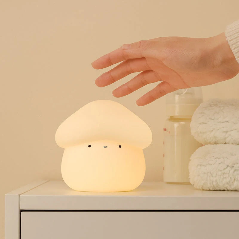 Adorable mushroom-shaped night light with warm yellow glow, perfect for children's bedrooms